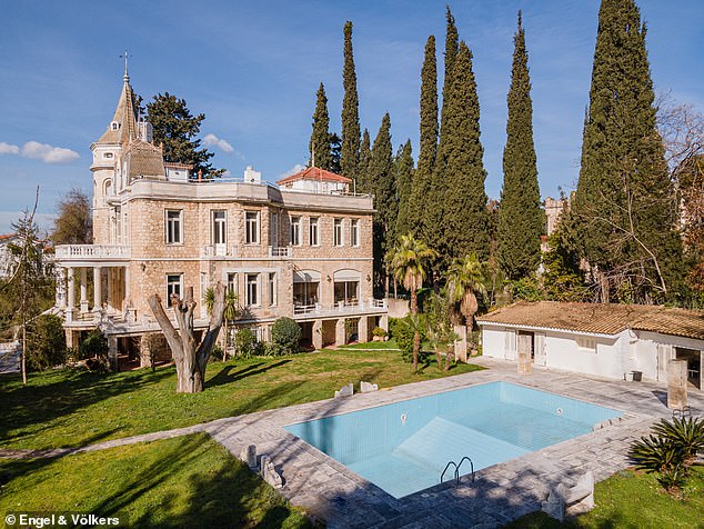Impressive: The mansion has a swimming pool, pool house and a large garden
