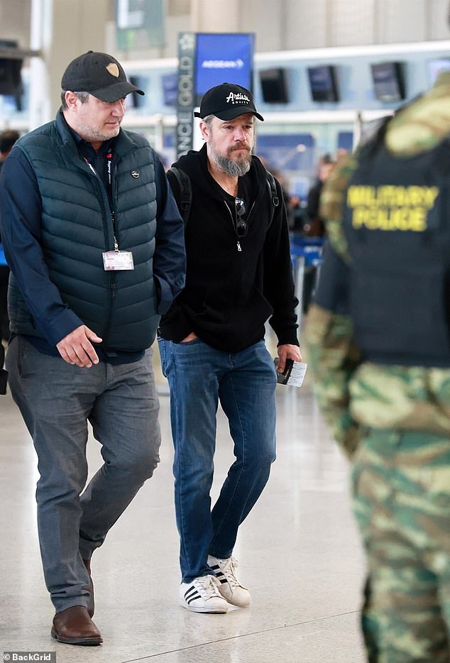 The Jason Bourne star was guided through the airport by security but managed to go largely unnoticed by fellow passengers
