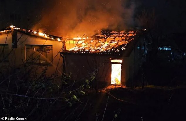 A shot of the burning nightclub, which shows the roof fully ablaze and an inferno raging inside the venue