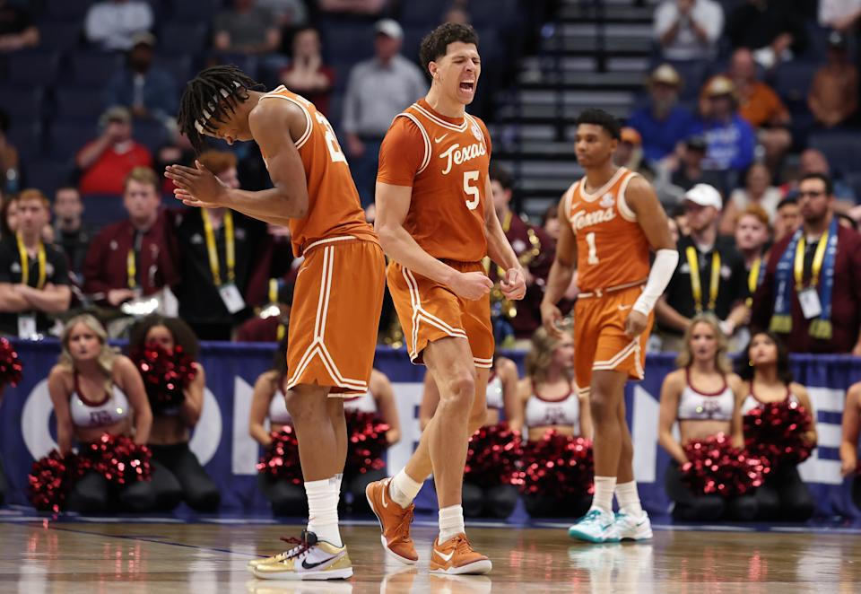NASHVILLE, TENNESSEE - MARCH 12: Kadin Shedrick #5 of the Texas Longhorns celebrates after the 94-89 2OT win over the Texas A&M Aggies during the SEC Men's Basketball Tournament - First Round at Bridgestone Arena on March 12, 2025 in Nashville, Tennessee. (Photo by Andy Lyons/Getty Images)