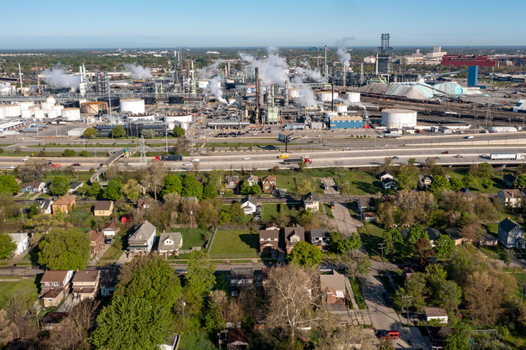 A low-income neighborhood is seen near an oil refinery in southwest Detroit. Credit: Jim West/UCG/Universal Images Group via Getty Images