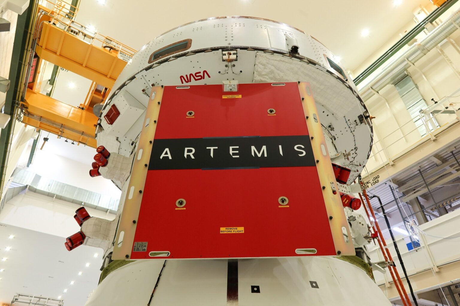 Engineers install Orion solar array wings for Artemis II