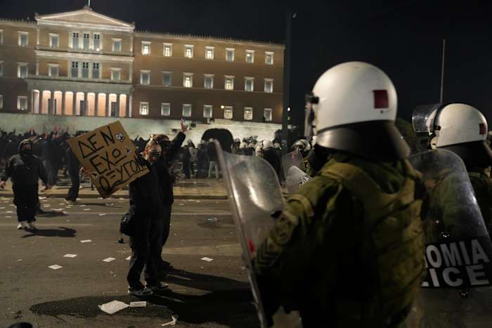 Protests turn violent as Greece’s government battles censure motion over deadly train crash Protests turn violent as Greece's government battles censure motion over deadly train crash