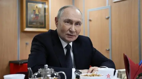 Reuters Vladimir Putin visits a nuclear-powered submarine Arkhangelsk, in Murmansk, Russia March 27, 2025.
