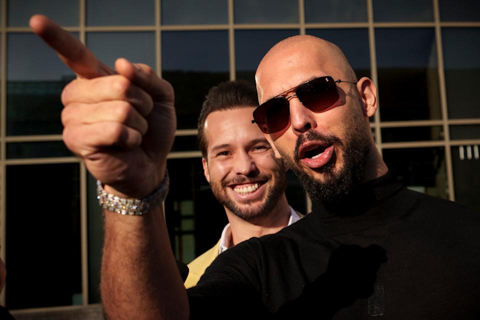 Andrew Tate, right, with his brother Tristan Tate
