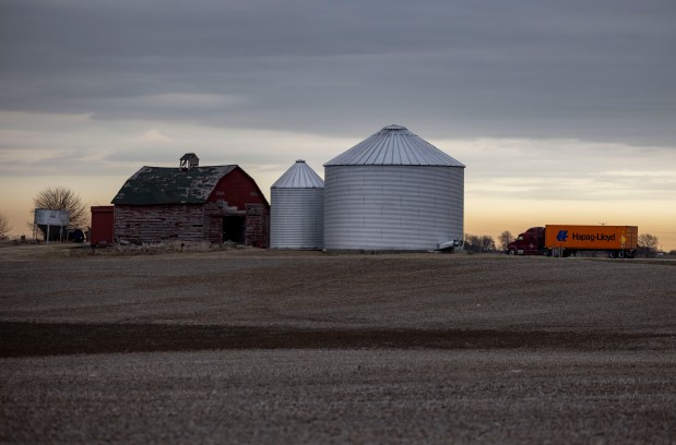 A barn and grain bins are located on Ridge Road in Minooka near the site of a proposed data center, March 19, 2025. "It's the best use of that land except for farmland," Mayor Offerman said of the data center project. "It's much better than a hundred different things they could put there." (Brian Cassella/Chicago Tribune)