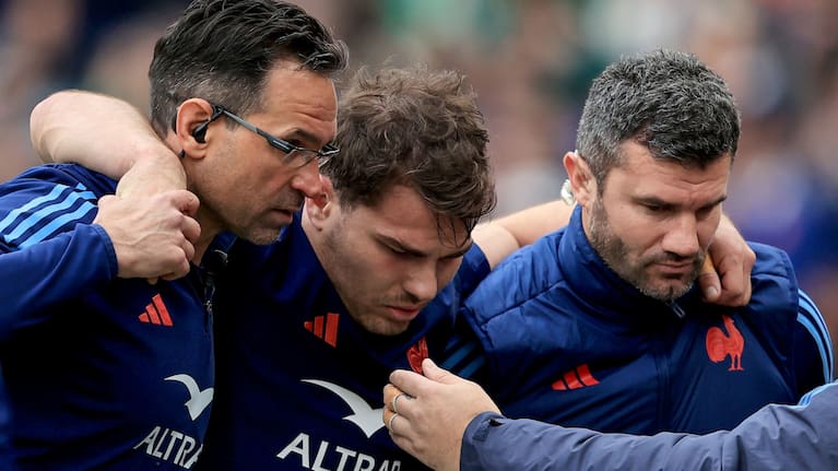France halfback and skipper Antoine Dupont leaves the field in Dublin with a knee injury.