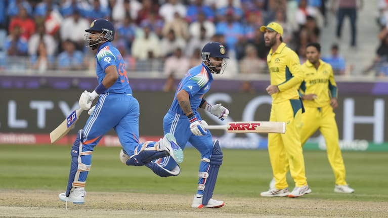 India's Virat Kohli, right, and India's Shreyas Iyer run between the wickets during their semifinal victory over Australia.