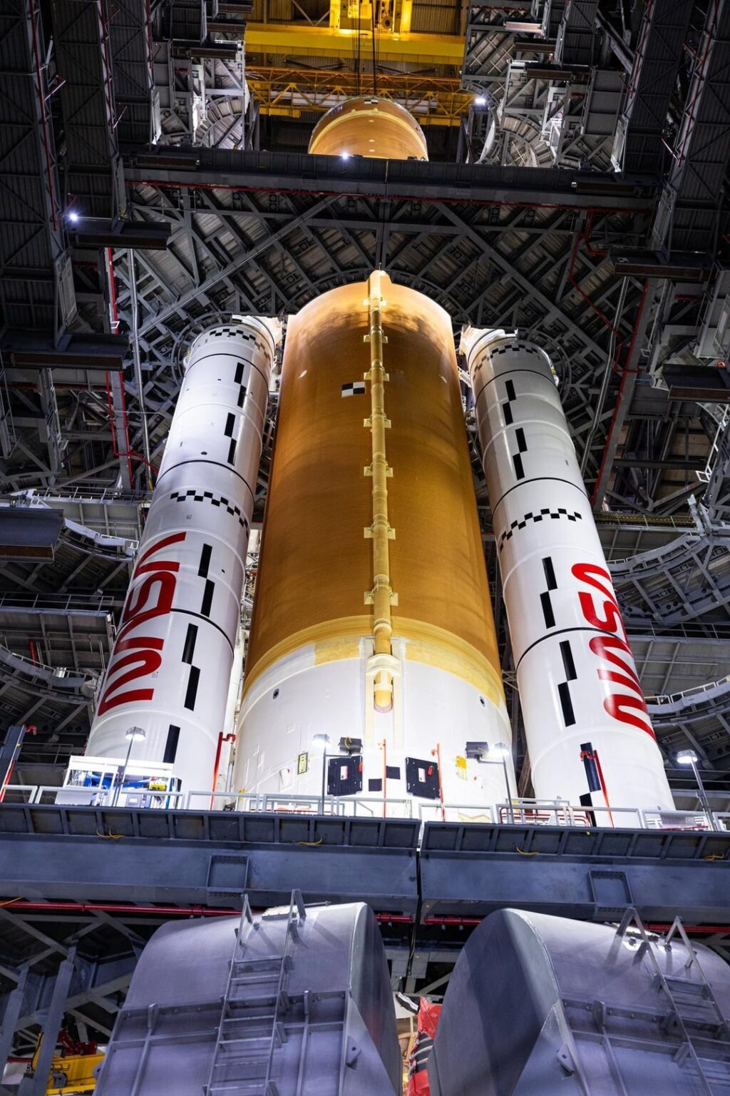 Photos of Artemis II Space Launch System (SLS) core stage stacking this past week [credit: NASA/Frank Michaux]