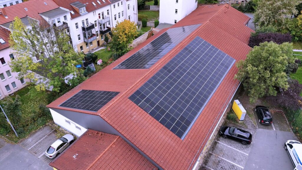 Reshape Energy is using an acquisition playbook to drive energy upgrades for commercial real estate Reshape Energy - solar panels on a commercial building