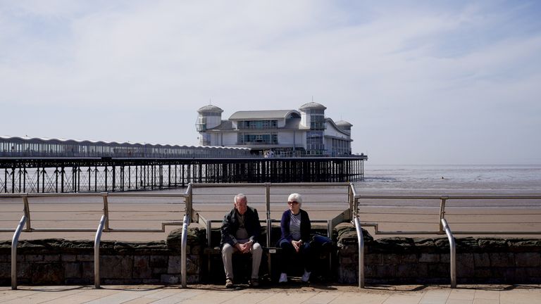 People enjoy the warm weather in Weston-super-Mare in Somerset. 
Pic: PA