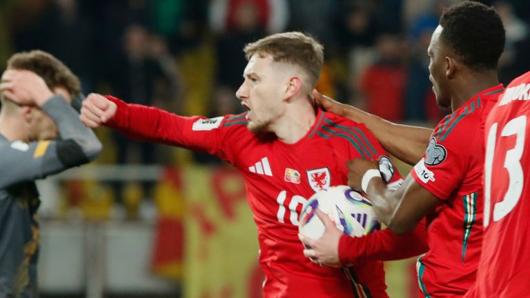 Wales' David Brooks celebrates with team-mates after scoring his side's opening goal during a World Cup 2026 group J qualifying soccer match between North Macedonia and Wales at National Arena Todor Proeski in Skopje, North Macedonia, Tuesday, March 25, 2025. (AP Photo/Boris Grdanoski)