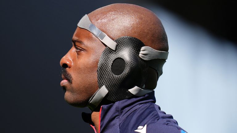 Crystal Palace's Jean-Philippe Mateta, wearing a protective guard, warms up before the FA Cup quarter-final at Craven Cottage