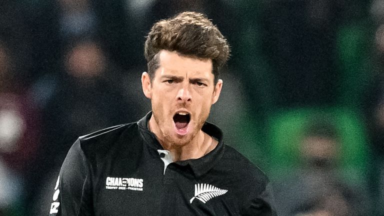 New Zealand's captain Mitchell Santner celebrates after taking the wicket of his South African counterpart Temba Bavuma during the ICC Champions Trophy one-day international (ODI) semi-final cricket match between New Zealand and South Africa at the Gaddafi Stadium in Lahore on March 5, 2025. (Photo by Asif HASSAN / AFP)