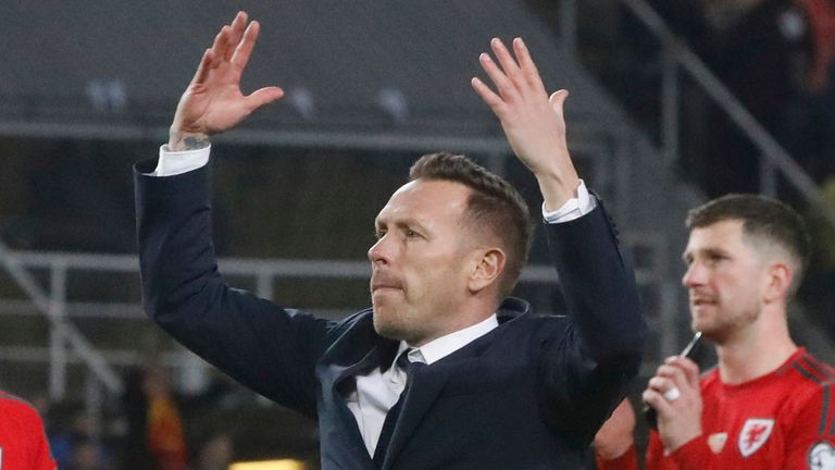 Wales' head coach Craig Bellamy celebrates at the end of a World Cup 2026 group J qualifying soccer match between North Macedonia and Wales at National Arena Todor Proeski in Skopje, North Macedonia, Tuesday, March 25, 2025. (AP Photo/Boris Grdanoski)