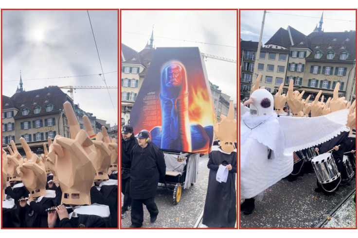 "Switzerland’s Anti-Trump Protestors Wear Giant Middle Fingers on Their Heads