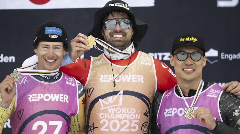 Tobias Mueller of Germany, from left, Ryan Regez of Switzerland, and Ryo Sugai of Japan, pose at the Skicross competition at the FIS Snowboard, Freestyle and Freeski World Championships in St. Moritz, Switzerland.