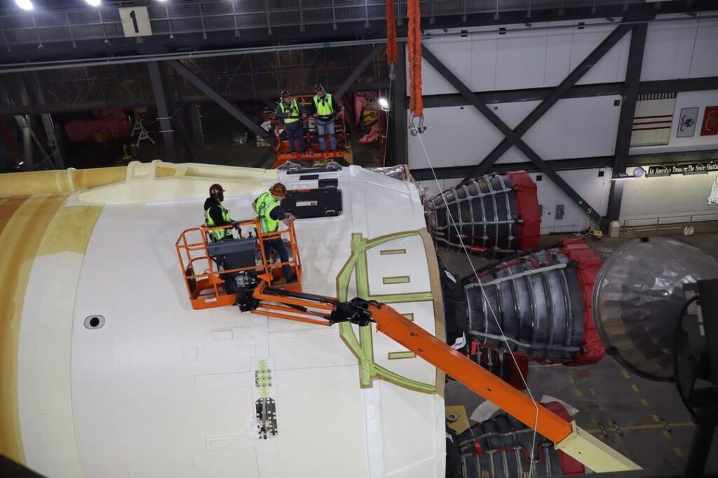 Artemis II Space Launch System core stage rigged for lift into the stack this week [credit: NASA EGS]