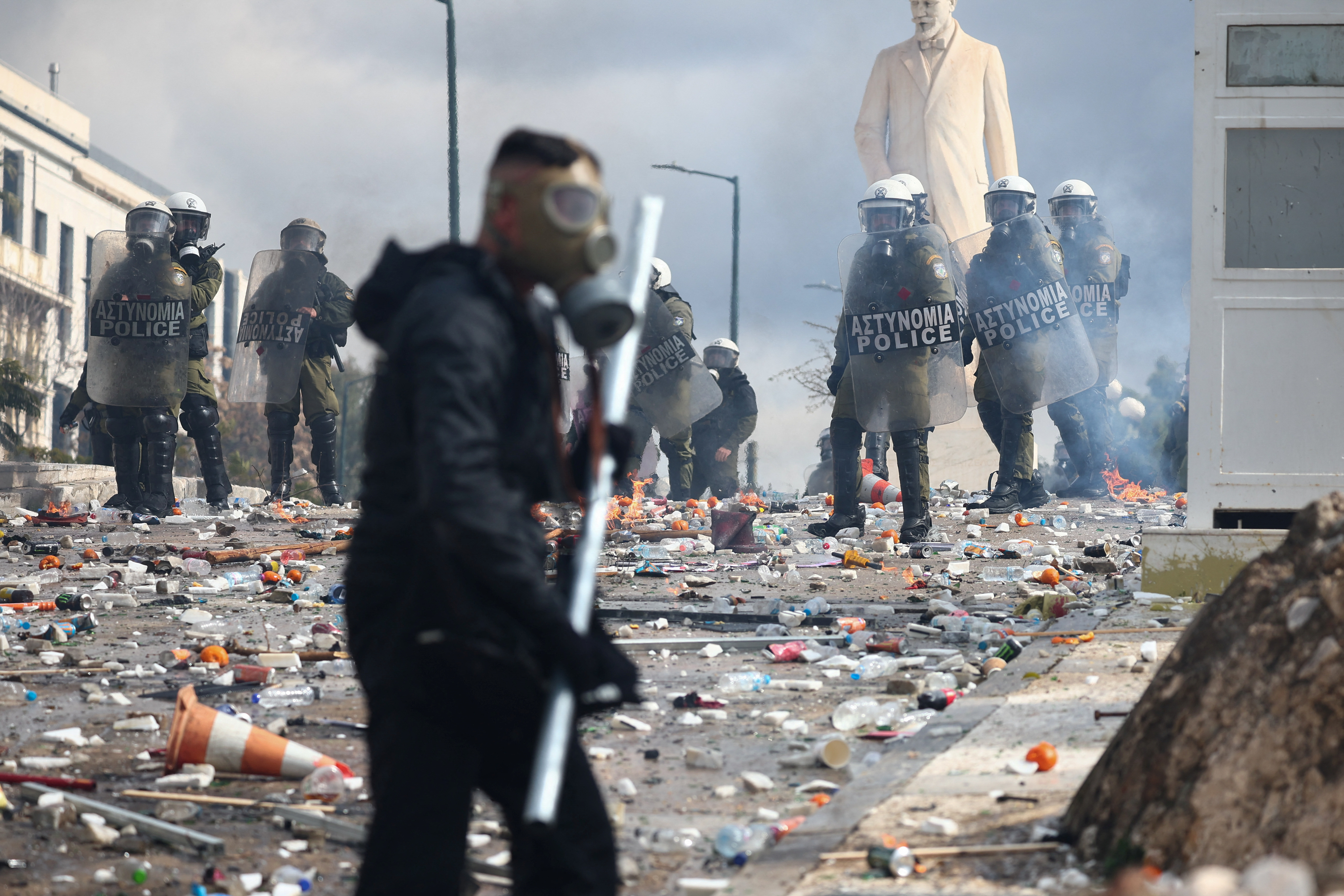 Riot police clash with protesters in Athens, Greece.