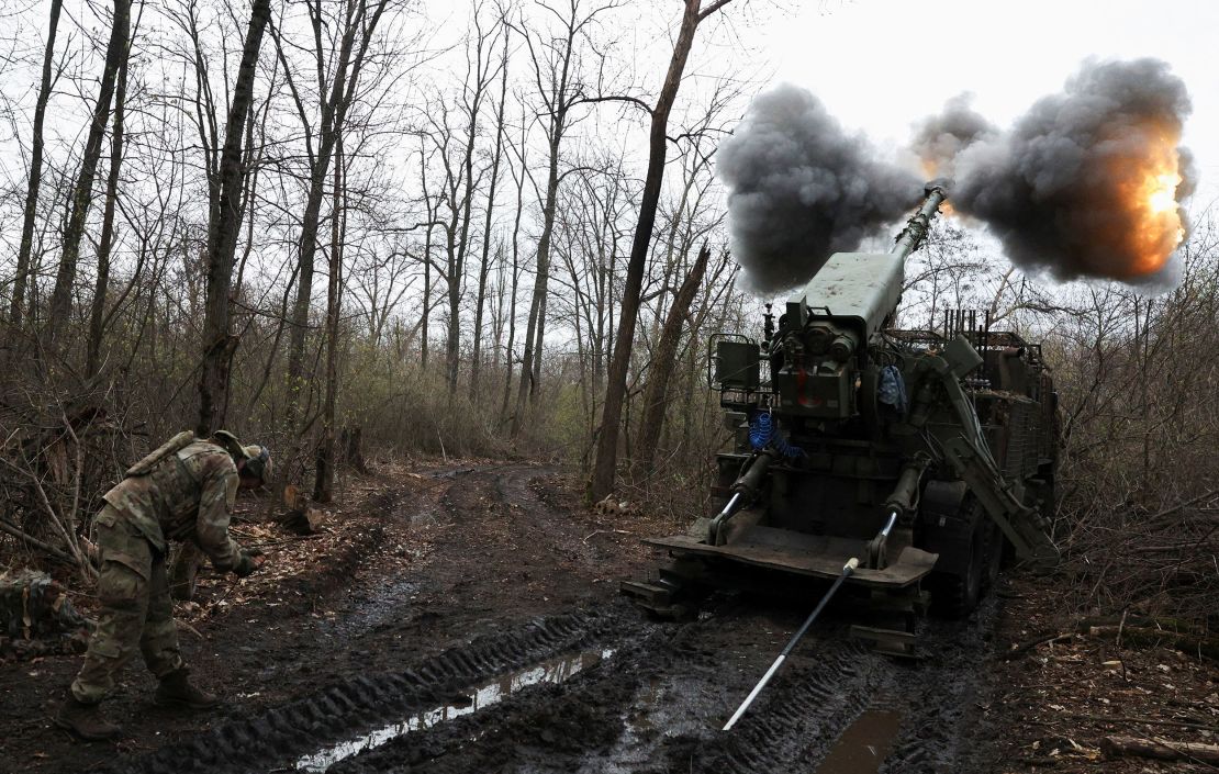 A Ukrainian gunner prepares to fire a howitzer towards Russian troops at an undisclosed location on the Donetsk frontline on April 6.