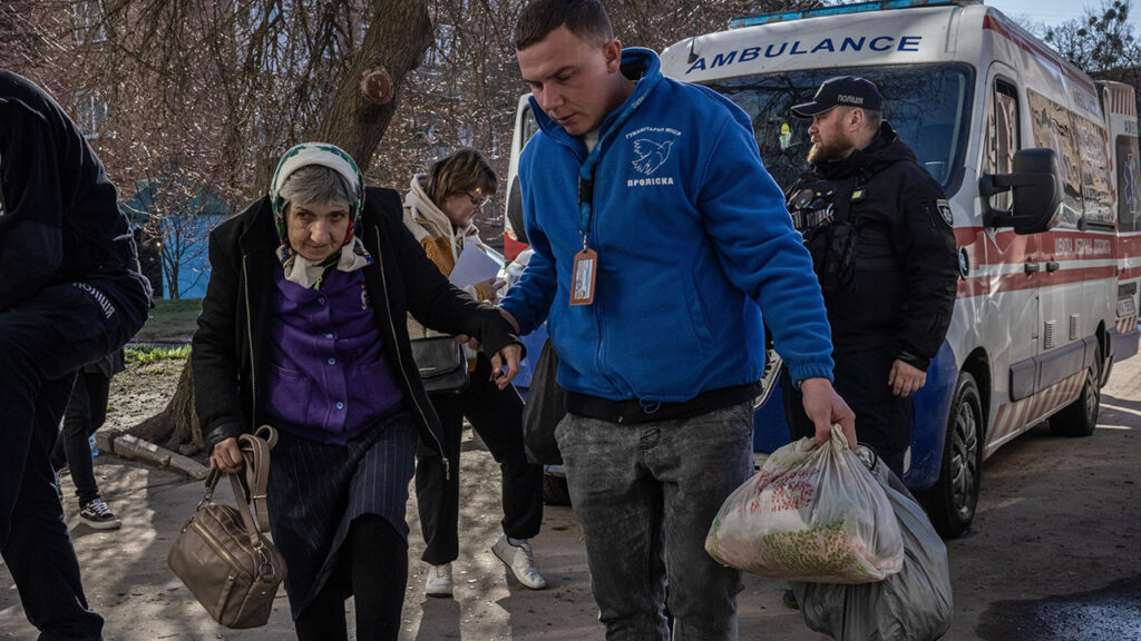 Zhelizniak Zoia, 61, arrives at an evacuation centre in Sumy from a village near the Russian border