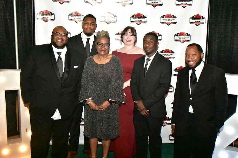Members of the Pine Bluff/Jefferson County Library System staff gather for a photo. The Jefferson County Sports Hall of Fame will be housed in the Bill Carr Museum at the Main Library. (Pine Bluff Commercial/I.C. Murrell)