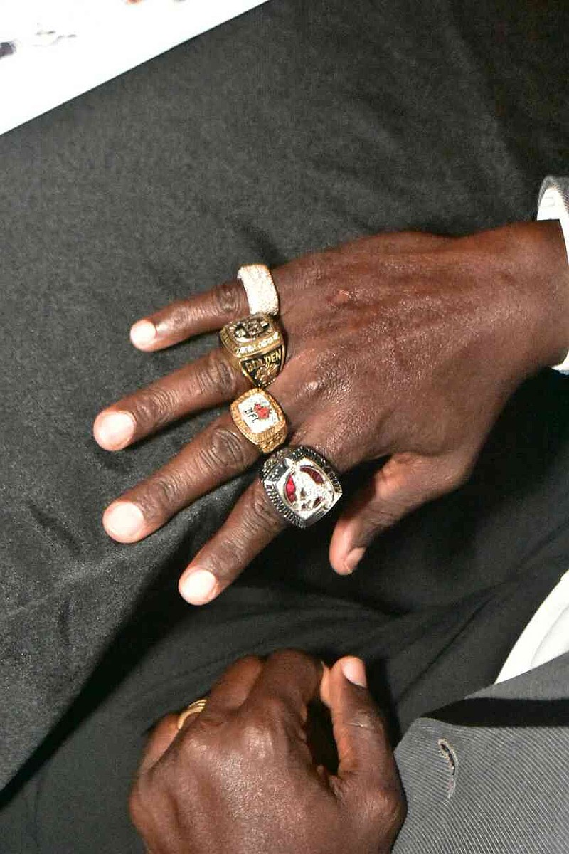 Former Pine Bluff High School and UAPB running back Martell Mallett wears his championship rings from his college and professional football days. (Pine Bluff Commercial/I.C. Murrell)