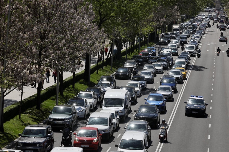A police car patrols on a road with no operating traffic lights in Madrid on April 28, 2025. 