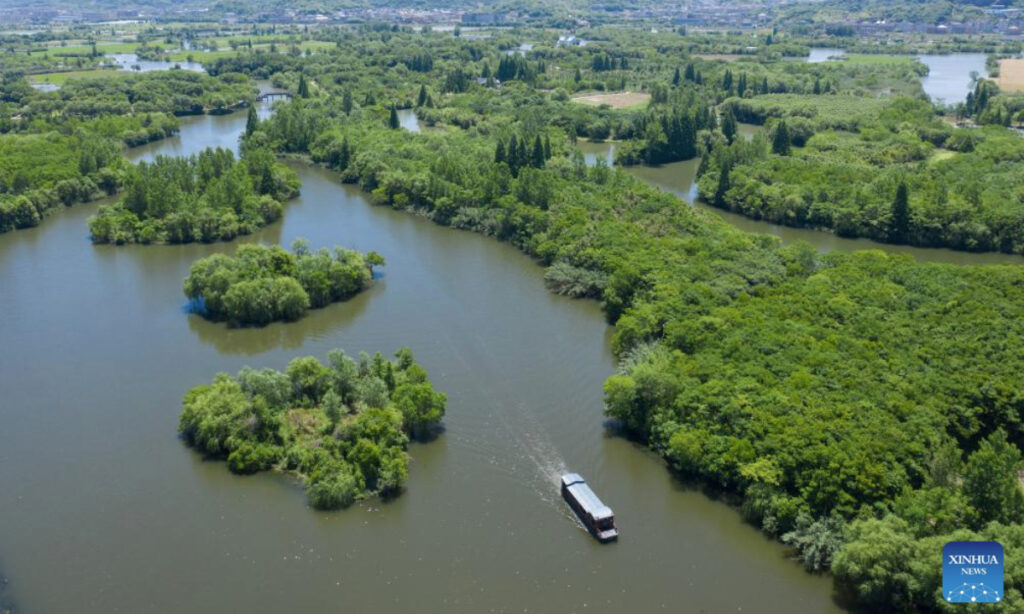 An aerial drone photo taken on May 16, 2024 shows a tourist boat at the Baita Lake national wetland park in Zhuji City, east China