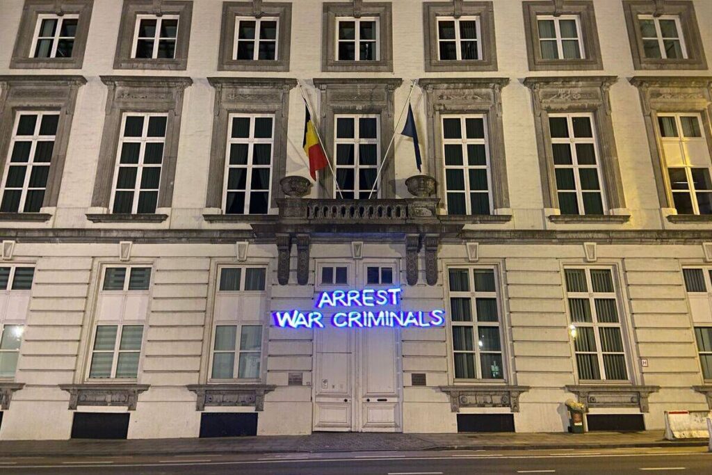 Activists project message ‘Arrest war criminals’ on Belgium government building over Netanyahu warrant – Middle East Monitor