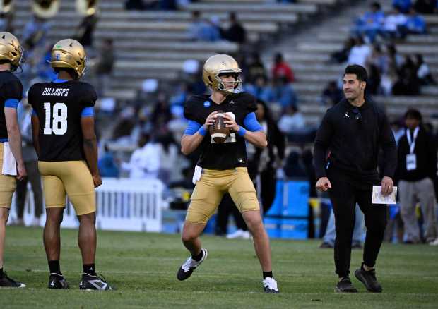 Quarterback Luke Duncan #12 of the UCLA Bruins during UCLA...
