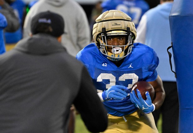 Karson Cox #33 of the UCLA Bruins during UCLA football...