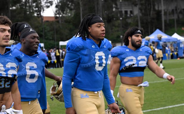 Running back Jalen Berger #0 of the UCLA Bruins during...