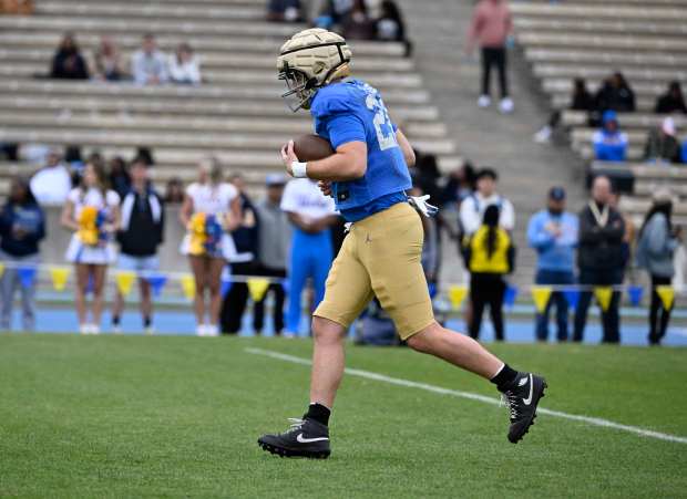 Tight end Jack Pedersen #28 of the UCLA Bruins during...