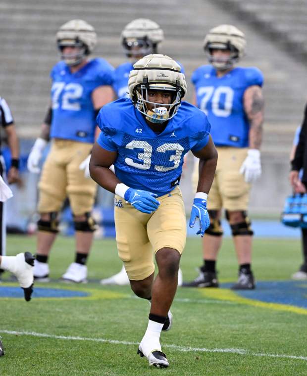 Karson Cox #33 of the UCLA Bruins during UCLA football...