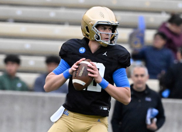 Quarterback Luke Duncan #12 of the UCLA Bruins during UCLA...