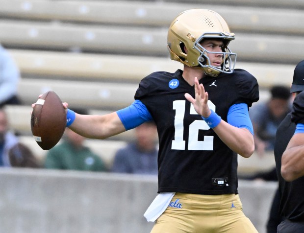 Quarterback Luke Duncan #12 of the UCLA Bruins during UCLA...