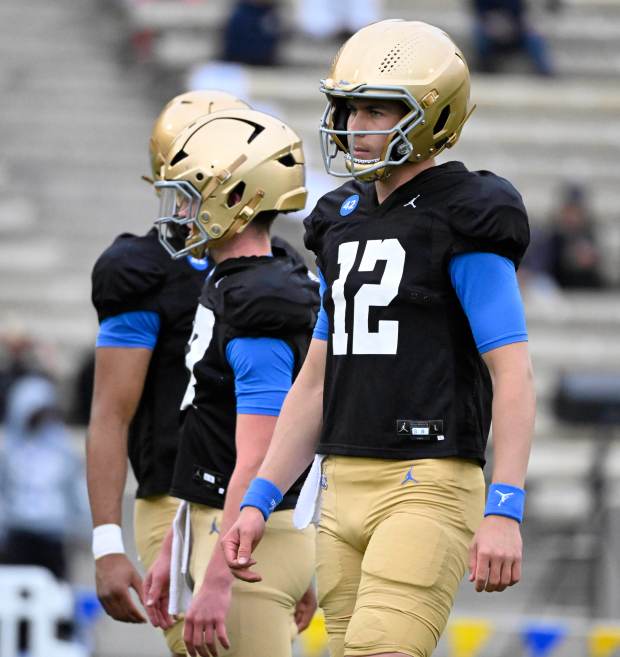Quarterback Luke Duncan #12 of the UCLA Bruins during UCLA...