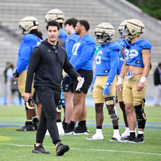 Assistant Coach, Offensive Coordinator/Quarterbacks, Tino Sunseri of the UCLA Bruins...