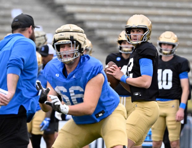 Quarterback Luke Duncan #12 of the UCLA Bruins during UCLA...