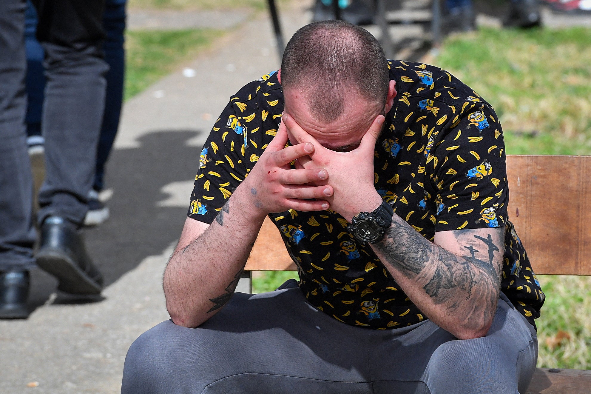 A relative of the victims of an overnight fire in a crowded nightclub in North Macedonia, wait for news of their loved ones at the Kocani General Hospital in Kocani, on 16 March 2025