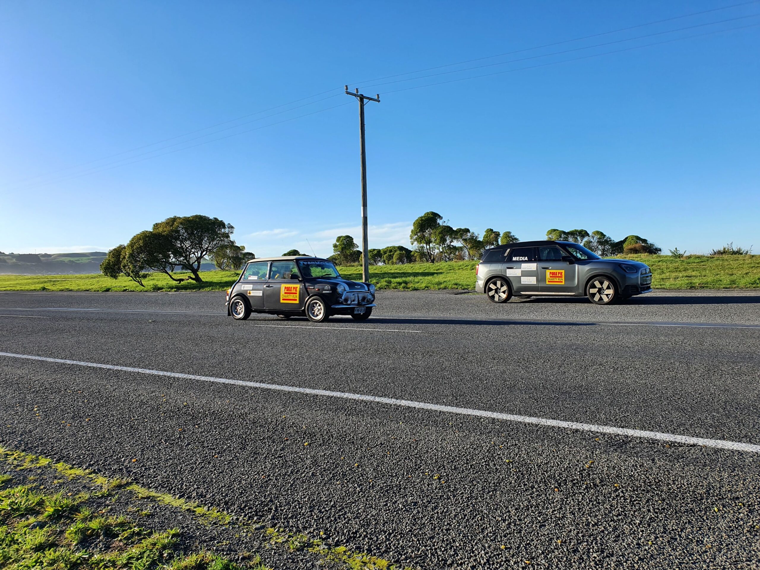The classic Mini of team 'Mini Bull' passing our 2025 Mini Countryman SE in the background on the 2025 Pork Pie Charity Run.