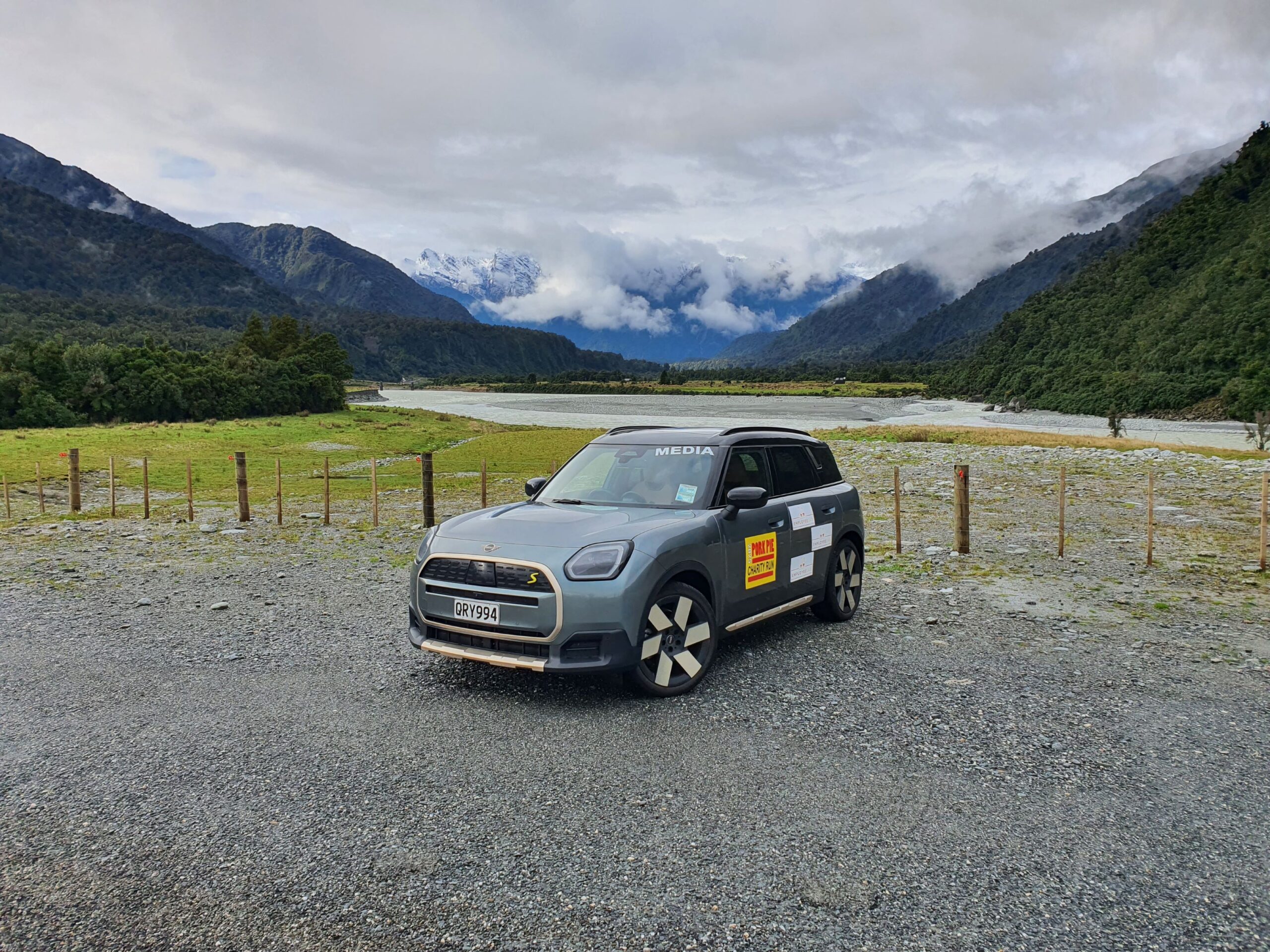Front three quarters view of a 2025 Mini Countryman SE All4 with the Southern Alps in the background on the 2025 Pork Pie Charity Run.