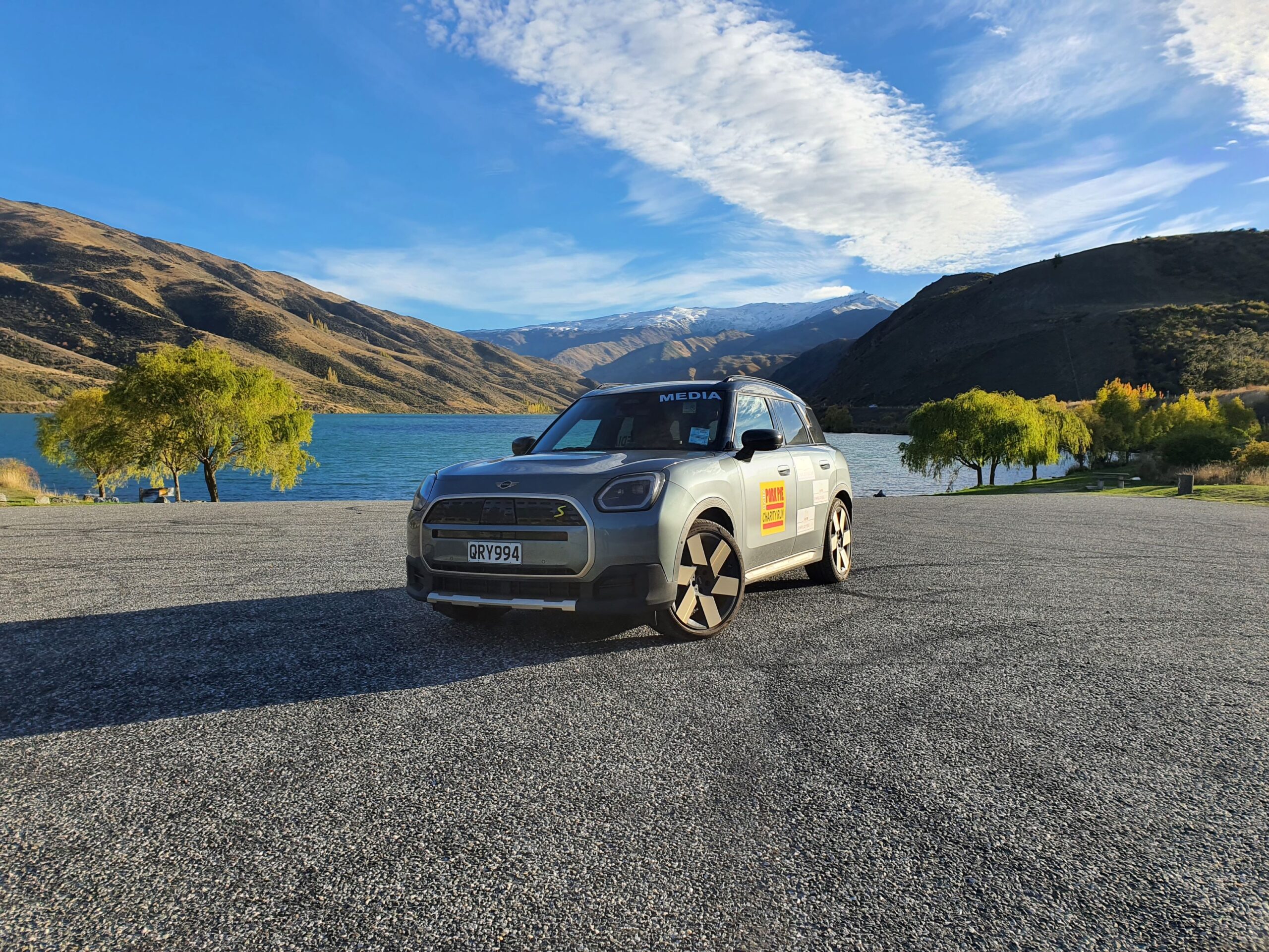 Front three quarters view of a 2025 Mini Countryman SE All4 pictured in front of Lake X near Clyde on the 2025 Pork Pie Charity Run.