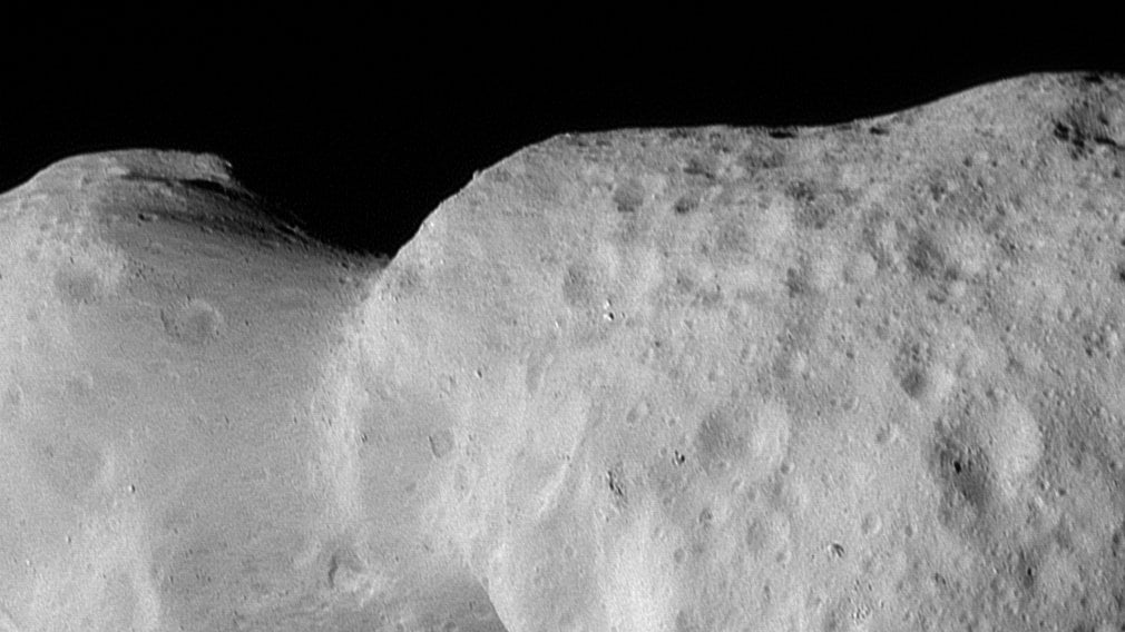 NASA's Lucy probe captures 1st close-up images of asteroid Donaldjohanson, revealing 'strikingly complicated geology'
