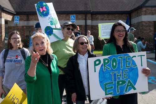 Dozens march for Earth Day in Ann Arbor