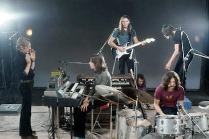 The documentary's director, Adrian Maben, gives instructions to Richard Wright as the rest of the band prepares to play. This image is from the recording session at Studio Europasonor in Paris, where 'Pink Floyd: Live At Pompeii' was completed.