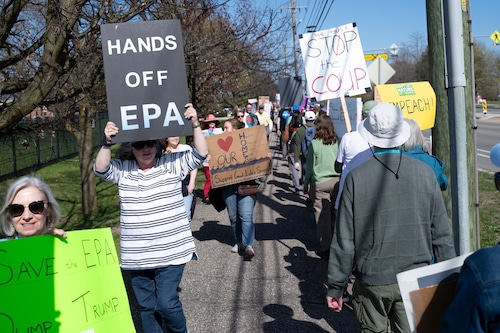 Dozens march for Earth Day in Ann Arbor