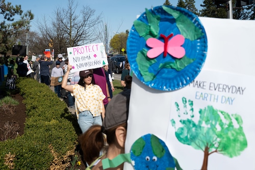 Dozens march for Earth Day in Ann Arbor