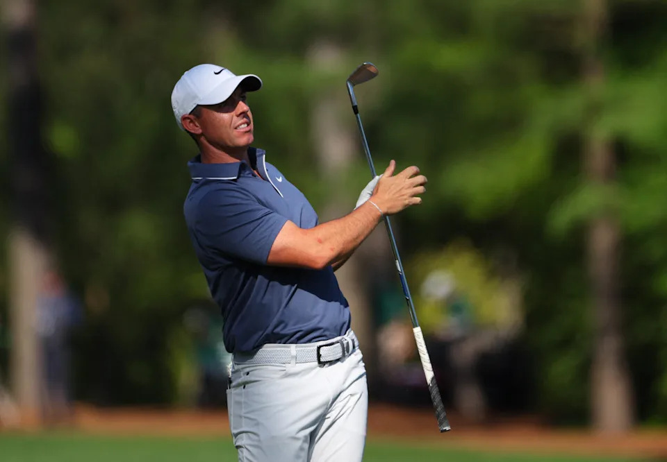 Golf - The Masters - Augusta National Golf Club, Augusta, Georgia, U.S. - April 13, 2025 Northern Ireland's Rory McIlroy watches his tee shot on the 12th hole during the final round REUTERS/Mike Segar
